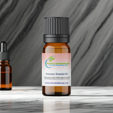 Rosemary essential oil aromatherapy bottle for muscle massage, focus diffusing, and daily herbal wellness practice.