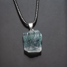 Rough amethyst gemstone pendant necklace with raw crystal stone for calming practice, protection, and casual fashion wear.