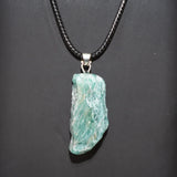 Rough natural amethyst stone pendant for meditation support, holistic use, and boho jewelry styling.