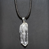 Rough purple amethyst crystal pendant with natural gemstone for spiritual grounding, crystal collection, and necklace wear.