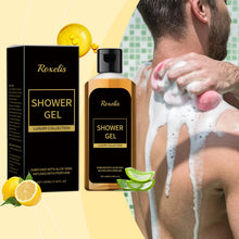 Roxelis Pheromone Shower Gel for Men bottle with lemon slices showing lemon fruit oil key ingredient on yellow background.