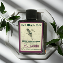 Run Devil Run Wish Oil protection oil bottle for banishing harmful influences and spiritual cleansing.