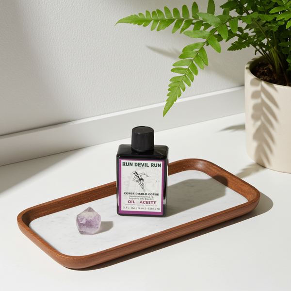 Run Devil Run Wish Oil spiritual oil bottle for protection, wish work, and negative energy removal.