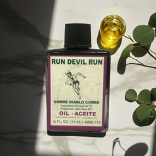 Run Devil Run Wish Oil wish oil bottle for manifestation, prayer, and protective ritual use.