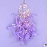 Rustic LED Dreamcatcher Pendant with Feathers hanging ornament for boho bedroom decor, soft lighting, and cozy interior styling.