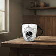 Saint/Sinner double-sided mug front view showing the Saint side design.