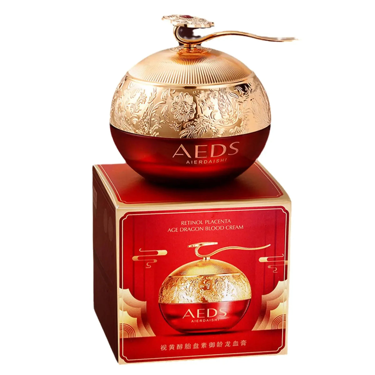 SAKSRAAR Dragon Blood Cream gold and red cosmetic container with packaging on white background.