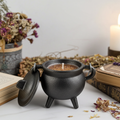 Sandalwood Smudge Candle in cast iron cauldron for spiritual cleansing, meditation, and ritual use.