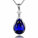 Sapphire teardrop pendant necklace in sterling silver for office wear, special events, and stylish layering.