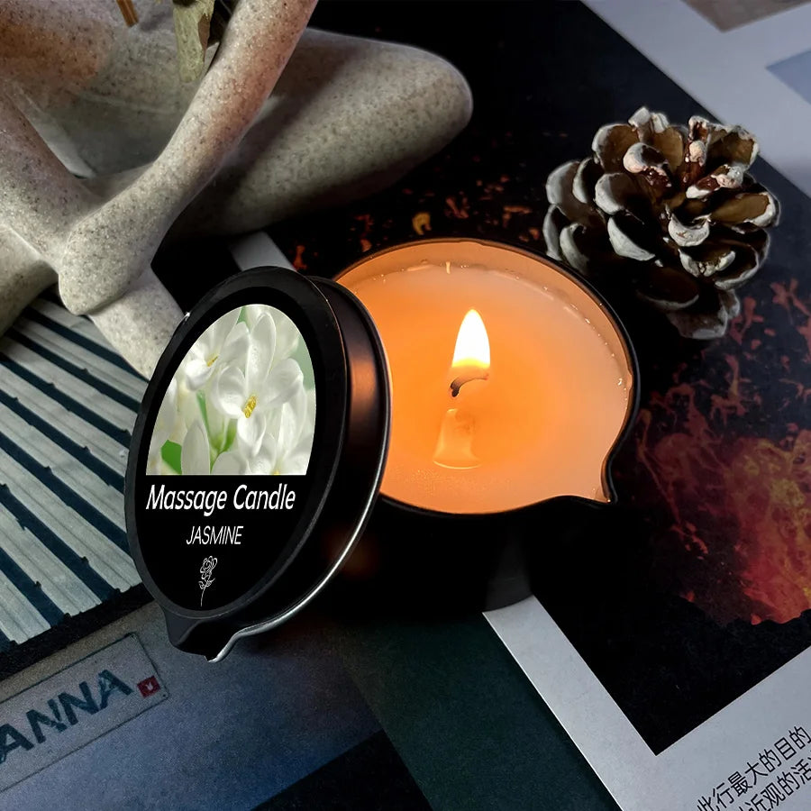Scented massage candle oil in a glass jar for skin-softening massage, relaxation, and aromatherapy sessions.
