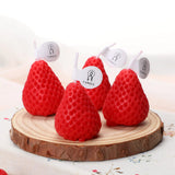 Scented strawberry shaped candle in soy wax for home fragrance, table styling, and cozy evenings.