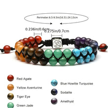 Seven Chakra Healing Crystal Bead Bracelet with polished stone beads for meditation, yoga practice, and spiritual healing.