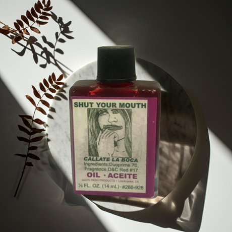 Shut Your Mouth Wish Oil ritual oil bottle for stopping rumors, calming harmful talk, and spiritual practice.
