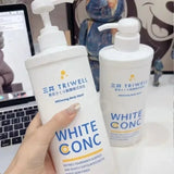 Two bottles of SI MI DA DANG Whitening Body Wash 550ml held by a hand with blurred background.