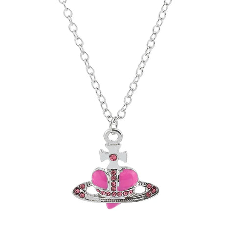 Trendy Silver Heart & Saturn Pendant necklace for celestial fashion looks, casual wear, and layering with other jewelry.