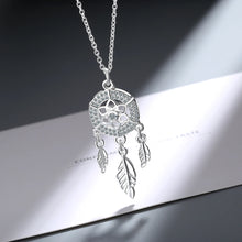 Silver feather Dreamcatcher Pendant necklace for bohemian fashion, daily accessorizing, and festival wear.
