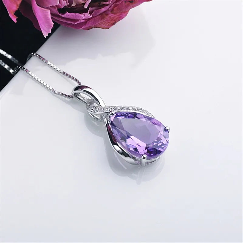 Silver pendant with Amethyst and Aquamarine stones for necklace making, outfit styling, and gift presentation.