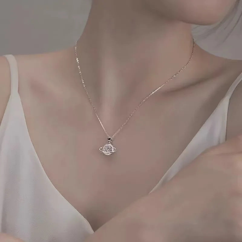 Silver planet pendant chain necklace for modern jewelry styling, casual use, and thoughtful gift giving.