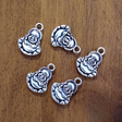 Sitting Buddha charm for jewelry making, meditation malas, and spiritual accessories.