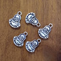 Sitting Buddha charm for jewelry making, meditation malas, and spiritual accessories.