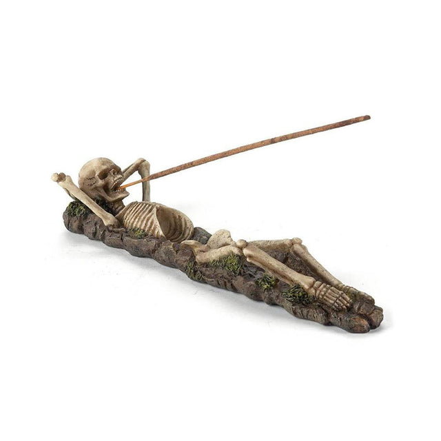 Skeleton incense holder for stick incense burning, altar decor, and gothic-themed styling.