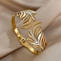 Slavena Gold Feather Rhinestone cuff bracelet for dressy styling, special occasions, and statement accessory wear.