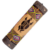 Small carved rainstick with turtle design percussion instrument for meditation music, sound rituals, and decorative display.