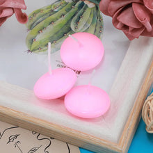 Small unscented floating disc candles for intimate table decor, event accents, and floating candle displays.