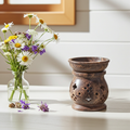 Soapstone aroma lamp oil burner for fragrance diffusion, home ambiance, and relaxation use.