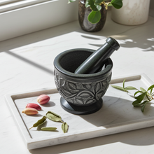 Soapstone Vines mortar and pestle set for grinding herbs, spices, and small kitchen ingredients.