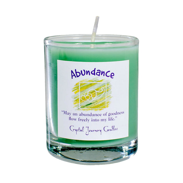 Soy herbal filled votive candle labeled Abundance, used in rituals for prosperity and growth