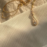 Sparkling round zircon pendant necklace in choker form for festive occasions, elegant styling, and daily fashion wear.