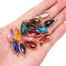 Sparkling teardrop crystal glass pendants for jewelry making, beading projects, and ornament decoration.