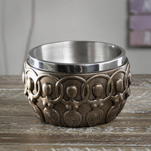 Spiral Goddess Smudge Bowl holding a lit smudge stick during a smoke cleansing ritual.