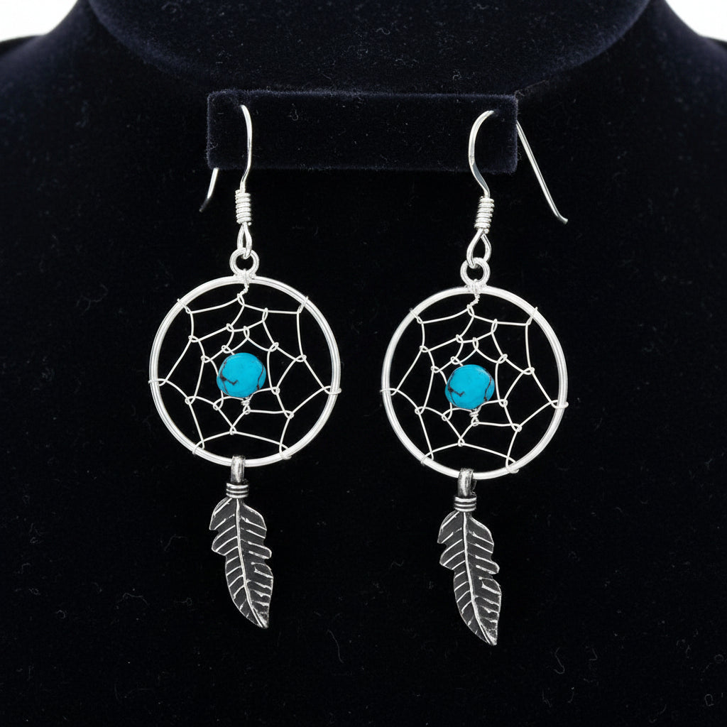 Sterling silver dreamcatcher earrings with dangling feather and bead