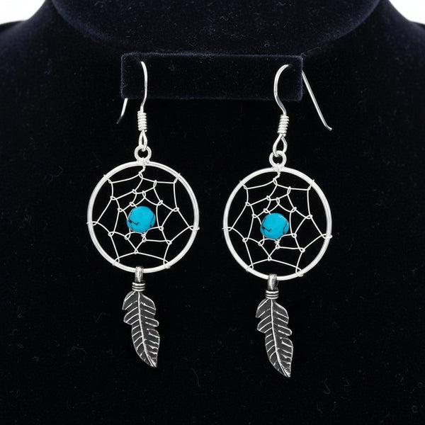 Sterling silver dreamcatcher earrings with dangling feather and bead