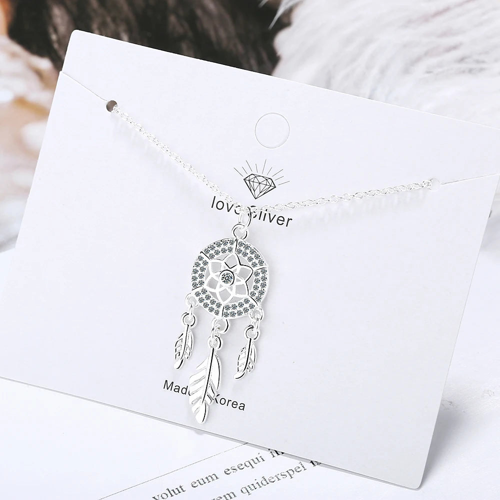 Sterling silver Dreamcatcher Feather Pendant for casual jewelry wear, layered styling, and special occasion accessorizing.