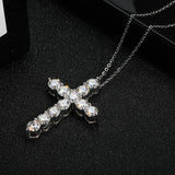 Sterling silver moissanite cross necklace with pendant for daily accessorizing, gifting, and elegant religious jewelry wear.