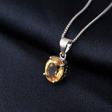 Sterling silver oval birthstone pendant necklace charm for daily accessorizing, birth month jewelry, and special occasion gifting.