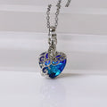 Sapphire teardrop pendant necklace in sterling silver for office wear, special events, and stylish layering.