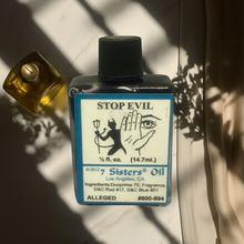 Stop Evil Wish Oil bottle for curse removal, cleansing, and protective spiritual practice.