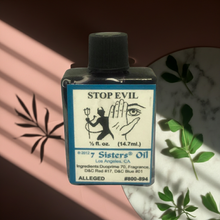 Stop Evil Wish Oil spiritual oil bottle for blocking negative energy, harmful intentions, and ritual protection.