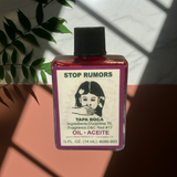 Stop Rumors Wish Oil dressing oil for candle work, prayer rituals, and stopping harmful talk.