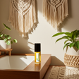Sunset Heat Body Oil bottle for moisturizing dry skin, softening the body, and daily skincare use.