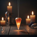 Sunstone 6-sided faceted pendulum on a 9-inch chain for dowsing