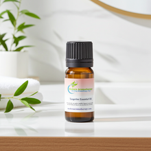Tangerine Essential Oil bottle for warm, sweet citrus aromatherapy, mood uplift, and calming home diffuser use.