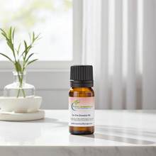 Tea Tree Essential Oil bottle for skin care aromatherapy, natural cleaning, and wellness support use.