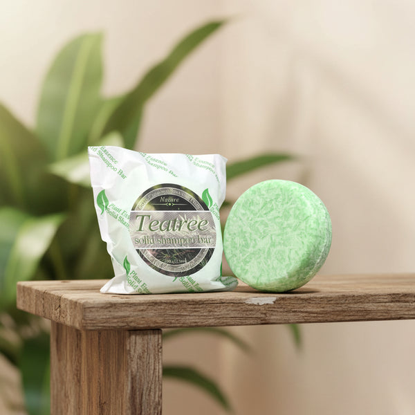 Tea Tree Essential Oil Shampoo Soap Bar 60g with eco-friendly packaging on white background.