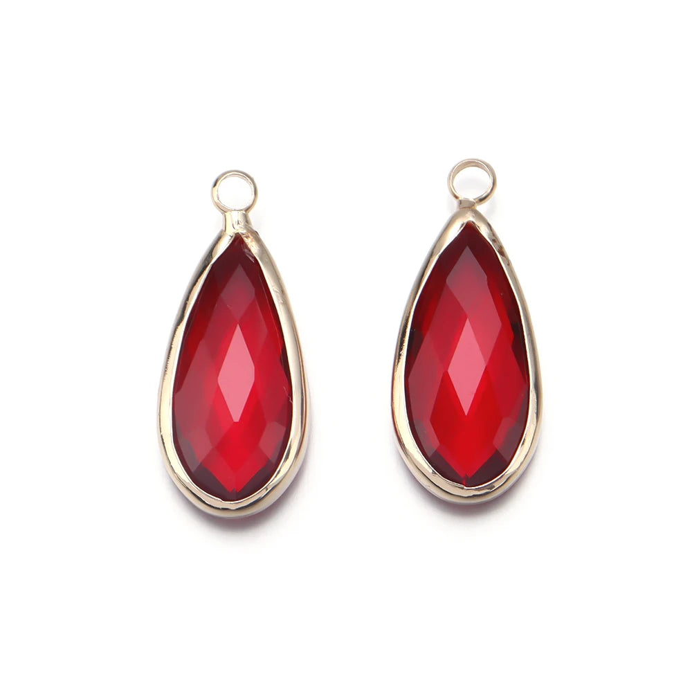 Teardrop crystal charms for necklace design, jewelry making, and decorative beading use.