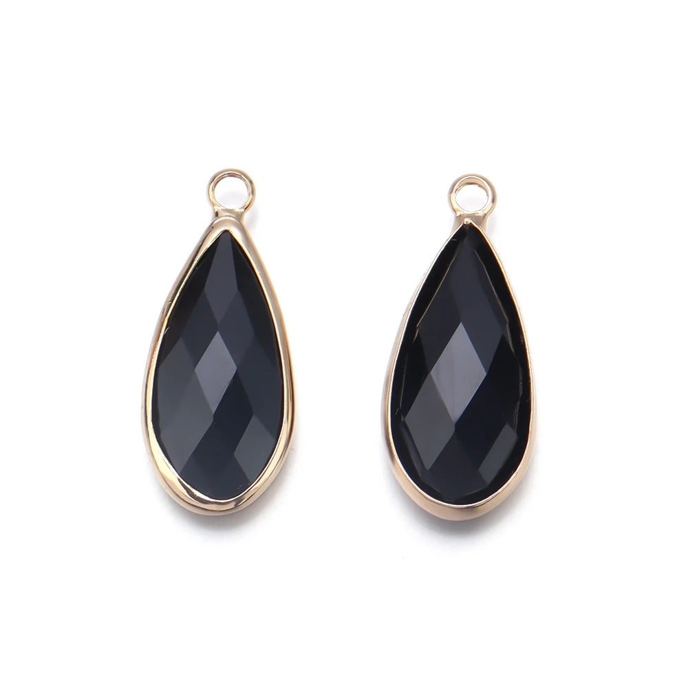 Teardrop crystal glass charms for DIY crafts, jewelry assembly, and decorative accessory making.